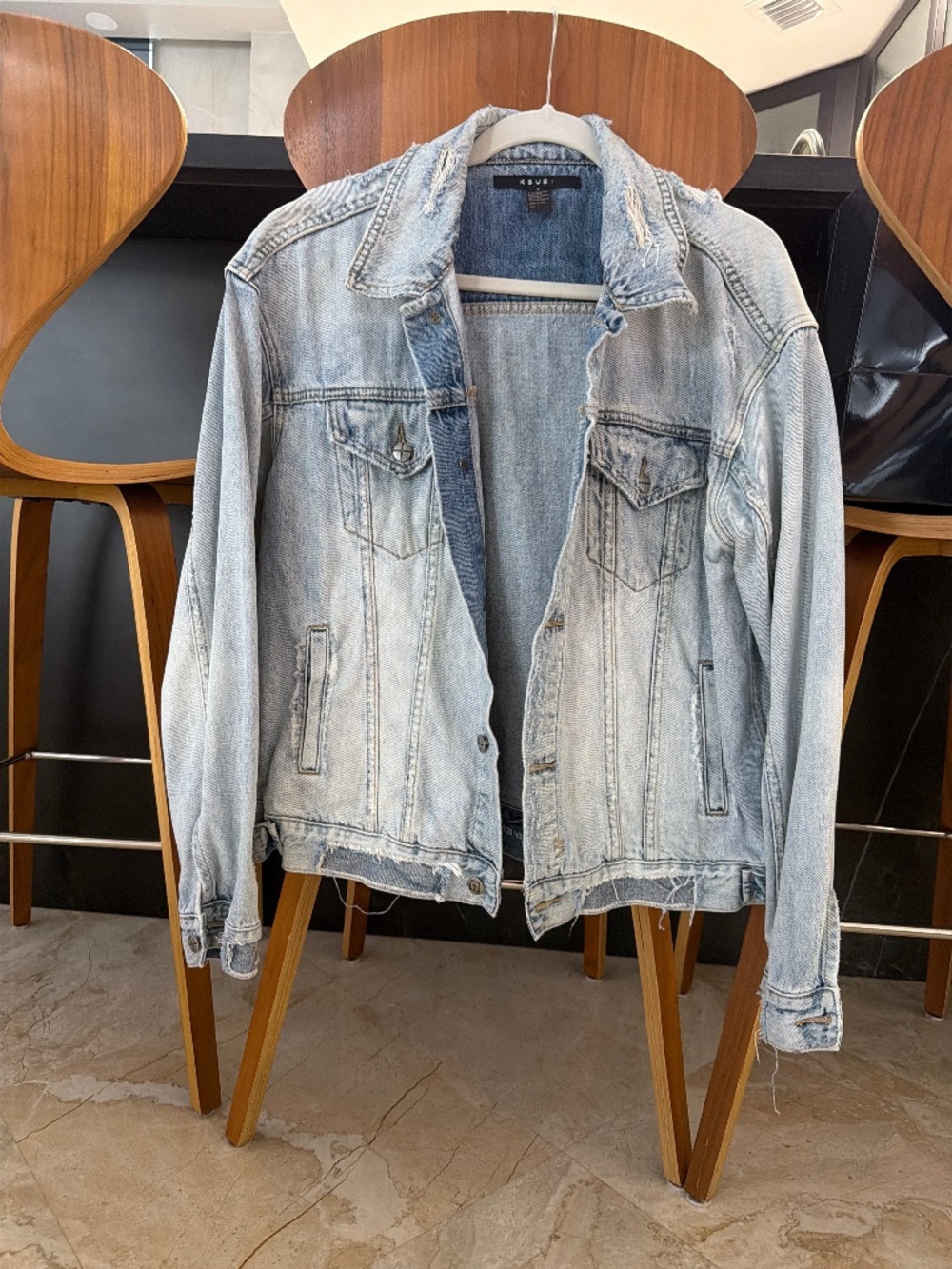 Distressed oversized jean jacket